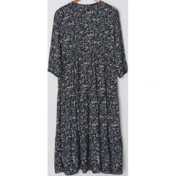 Sukienka w kwiaty -. Sukienki damskie House, s, w kwiaty, bez kołnierzyka, bez rękawów. Za 119,99 zł.