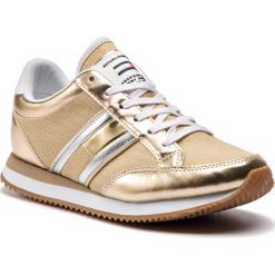 Sneakersy TOMMY JEANS - Casual Retro Sneaker EN0EN00413 Light Gold 715. Żółte półbuty damskie Tommy Jeans, z jeansu. Za 399,00 zł.