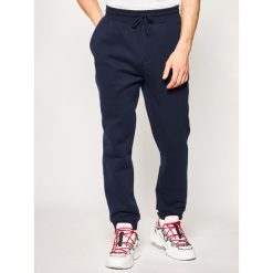 Spodnie dresowe Tommy Jeans Classics DM0DM07213. Niebieskie jeansy męskie Tommy Jeans, xxl, bez wzorów. W wyprzedaży za 219,00 zł.