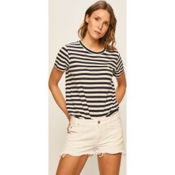 Tommy Jeans - T-shirt. Niebieskie bluzki damskie Tommy Jeans, s, bez wzorów, z bawełny, casualowe, z okrągłym kołnierzem, z krótkim rękawem. Za 179,90 zł.