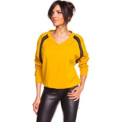 Bluza "Sylvie" w kolorze żółtym. Żółte swetry damskie Saint Germain Paris, s, bez wzorów, bez rękawów, bez kaptura. W wyprzedaży za 128,95 zł.