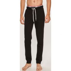 Moschino Underwear - Spodnie piżamowe. Czarne piżamy męskie Moschino Underwear, na co dzień, s, bez wzorów, z elastanu. Za 739,90 zł.