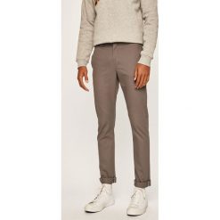Dickies - Spodnie. Szare spodnie męskie Dickies, na co dzień, bez wzorów, z bawełny, casualowe. W wyprzedaży za 159,90 zł.