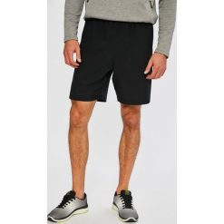 Under Armour - Szorty Woven Graphic Wordmark. Szare spodenki sportowe męskie marki Under Armour, z poliesteru, sportowe. Za 119,90 zł.