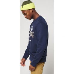 O'Neill Bluza Niebieski. Niebieskie bluzy męskie O'Neill, xxl, z nadrukiem, z bawełny, bez kołnierzyka, bez rękawów, bez kaptura. Za 223,95 zł.