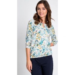 Bluzki damskie: Bluzka bombka w florystyczny print QUIOSQUE