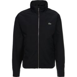 Lacoste Kurtka wiosenna black. Szare kurtki męskie marki Lacoste, z bawełny. Za 779,00 zł.