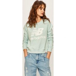 New Balance - Bluza. Niebieskie bluzy damskie New Balance, s, z nadrukiem, z elastanu, bez rękawów, bez kaptura. W wyprzedaży za 179,90 zł.