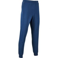 Spodnie dresowe Gym & Pilates 500 męskie. Spodnie męskie Puma, m, bez wzorów, z bawełny. Za 159,99 zł.