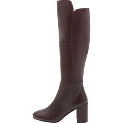 KIOMI Kozaki wine. Czerwone buty zimowe damskie KIOMI, z materiału. W wyprzedaży za 323,95 zł.