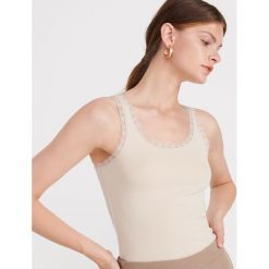 Top z bawełny organicznej - Beżowy. Brązowe topy damskie Reserved, xl, bez wzorów, z bawełny, bez kołnierzyka. Za 24,99 zł.
