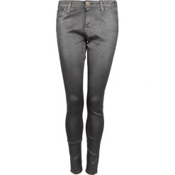 Tommy Hilfiger Spodnie "Natalie". Jeansy damskie TOMMY HILFIGER, z jeansu. Za 189,00 zł.