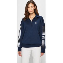 Adidas Originals - Bluza. Niebieskie bluzy damskie adidas Originals, bez wzorów, z elastanu, z krótkim rękawem, krótkie, bez kaptura. W wyprzedaży za 219,90 zł.
