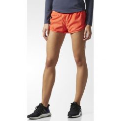 Adidas Supernova TKO Reversible Short W Pomarańczowe. Pomarańczowe szorty damskie Adidas, bez wzorów. Za 79,99 zł.