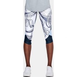 Spodnie dresowe damskie: Under Armour Spodnie damskie ARMOUR FL FAST PRNTD CAPRI granatowo-białe r. S (1320321-409)