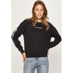 New Balance - Bluza. Czarne bluzy damskie New Balance, s, z nadrukiem, z elastanu, bez rękawów, bez kaptura. Za 229,90 zł.