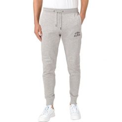 Tommy Hilfiger Spodnie dresowe Szary. Szare spodnie męskie TOMMY HILFIGER, xl, z haftami, z bawełny. Za 514,95 zł.
