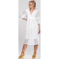 Biała Sukienka Box. Białe sukienki damskie other, s, bez wzorów, boho, bez kołnierzyka, bez rękawów, midi. Za 94,99 zł.