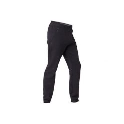 Spodnie dresowe slim Gym & Pilates 530 męskie. Niebieskie spodnie męskie DOMYOS, s, bez wzorów, z elastanu. Za 99,99 zł.
