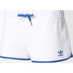 Spodenki adidas Originals Slim Shorts (BJ8371). Czarne szorty damskie marki Alpha Industries, z materiału. Za 44,99 zł.