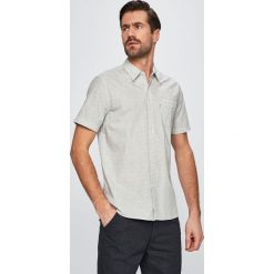 Levi's - Koszula. Białe koszule męskie marki Levi's®, s, bez wzorów, z bawełny, klasyczne, z klasycznym kołnierzykiem, z krótkim rękawem. Za 189,90 zł.