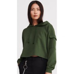 Bluza z kieszeniami na rękawach - Khaki. Brązowe bluzy damskie Reserved, m. W wyprzedaży za 39,99 zł.