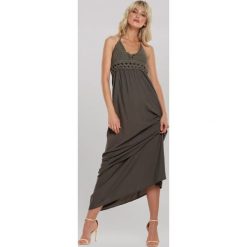 Ciemnozielona Sukienka Dancemaker. Zielone sukienki damskie Renee, s, w ażurowe wzory, boho, maxi, rozkloszowane. Za 119,99 zł.