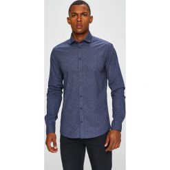 Casual Friday - Koszula. Niebieskie koszule męskie marki Casual Friday, m, z elastanu, casualowe, z włoskim kołnierzykiem, z długim rękawem. W wyprzedaży za 119,90 zł.