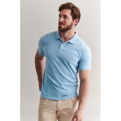 Koszulka polo w kolorze jasnoniebieskim. Niebieskie koszulki męskie TATUUM, xl, bez wzorów, z bawełny, polo, bez rękawów. W wyprzedaży za 64,95 zł.