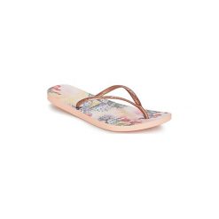 Japonki Reef REEF ESCAPE LUX PRINT. Żółte klapki damskie marki Reef, bez wzorów, bez obcasa. Za 119,00 zł.