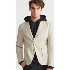 Dzianinowa marynarka slim fit - Beżowy. Brązowe marynarki męskie Reserved, s, bez wzorów, z dzianiny. Za 239,99 zł.