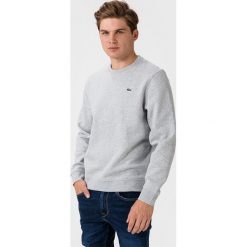 Lacoste Bluza Szary. Szare bluzy męskie Lacoste, l, bez wzorów, z elastanu, sportowe, bez kołnierzyka, bez rękawów, bez kaptura. Za 447,95 zł.