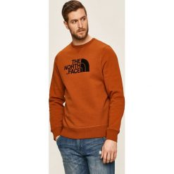 The North Face - Bluza. Pomarańczowe bluzy męskie The North Face, s, z nadrukiem, z bawełny, z okrągłym kołnierzem, bez rękawów, bez kaptura. W wyprzedaży za 249,90 zł.