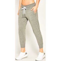 Spodnie dresowe DKNY Sport DP9P1966. Szare spodnie damskie DKNY Sport, xs, z bawełny, sportowe. W wyprzedaży za 269,00 zł.