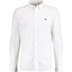 Lacoste LIVE Koszula blanc. Białe koszule męskie marki Lacoste LIVE, xs, z bawełny. Za 369,00 zł.