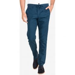 Jack & Jones Marco Spodnie Niebieski. Niebieskie spodnie męskie Jack & Jones, bez wzorów, z elastanu. Za 268,95 zł.
