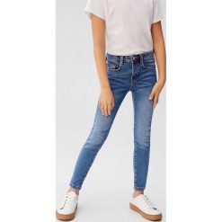 Mango Kids - Jeansy dziecięce 110-164 cm. Zielone jeansy dziewczęce Mango Kids, bez wzorów, z elastanu. W wyprzedaży za 55,90 zł.