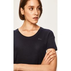 Lacoste - T-shirt. Białe bluzki damskie Lacoste, bez wzorów, z lyocellu, casualowe, z okrągłym kołnierzem. W wyprzedaży za 199,90 zł.