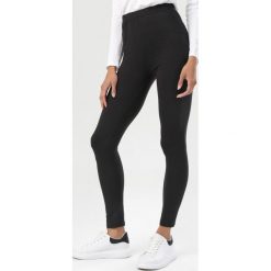 Czarne Legginsy Menimei. Czarne legginsy damskie Born2be, s, bez wzorów. Za 49,99 zł.