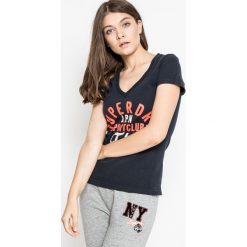 Superdry - Top. Niebieskie bluzki damskie marki Superdry, s, z nadrukiem, z bawełny, casualowe, z krótkim rękawem. W wyprzedaży za 69,90 zł.