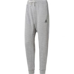 MĘSKIE SPODNIE DRESOWE REEBOK ESSENTIALS MARBLE (S). Spodnie męskie Reebok, s, bez wzorów, z bawełny. W wyprzedaży za 159,99 zł.