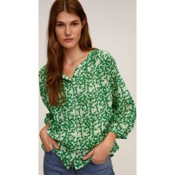 Mango - Bluzka Jungle. Żółte bluzki damskie Mango, na co dzień, s, w kwiaty, z bawełny, casualowe, bez kołnierzyka, bez rękawów. W wyprzedaży za 59,90 zł.