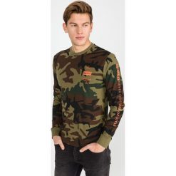 Levi's Koszulka Zielony. Zielone t-shirty męskie Levi's®, s, bez wzorów, z bawełny, bez kołnierzyka, długie. Za 171,95 zł.