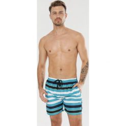 Jasnoniebieskie Szorty Corralora. Niebieskie spodenki i szorty męskie Born2be, xl, bez wzorów. W wyprzedaży za 19,99 zł.