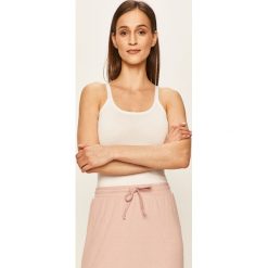 Fila - Top. Niebieskie bluzki damskie Fila, s, bez wzorów, z elastanu, casualowe, z okrągłym kołnierzem, bez rękawów. Za 64,90 zł.
