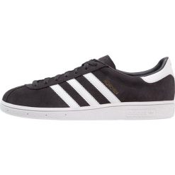 Adidas Originals MÜNCHEN Tenisówki i Trampki carbon/footwear white/gold metallic. Szare tenisówki damskie marki adidas Originals, z materiału. W wyprzedaży za 359,20 zł.
