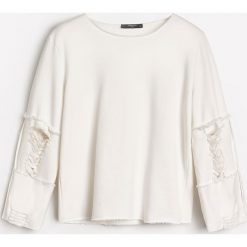 Bluza z podartymi rękawami - Kremowy. Białe bluzy damskie Reserved, l. Za 119,99 zł.