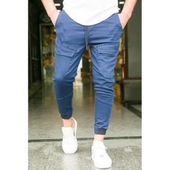 Męskie spodnie SCOTT BLUE. Niebieskie jeansy męskie Męskie spodnie SCOTT BLUE, s, bez wzorów, z jeansu. W wyprzedaży za 99,00 zł.