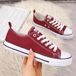 Tenisówki tekstylne bordowe American Club - bordowy. Czerwone trampki i tenisówki damskie American CLUB, bez wzorów, bez zapięcia. Za 49,99 zł.