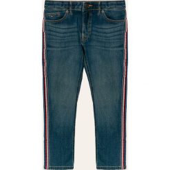 Tommy Hilfiger - Jeansy dziecięce 128-176 cm. Niebieskie jeansy dziewczęce TOMMY HILFIGER, bez wzorów, z elastanu. Za 299,90 zł.